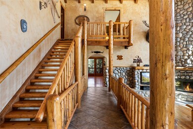 Hall area to kitchen, staircase to master suite