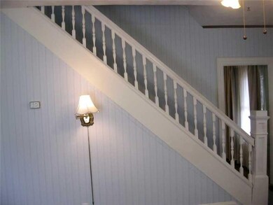 Living Room. The stair rail and post is just so ve