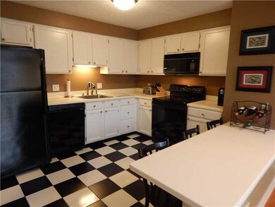 Kitchen. The disposal, dishwasher, electric stove,