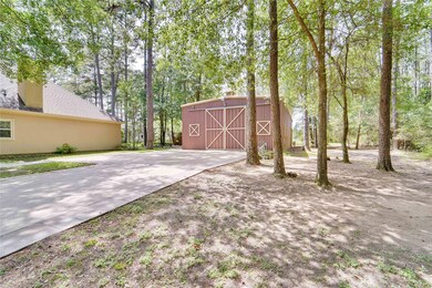 The workshop/metal building would be perfect for entertaining with doors opening to the large parking area and also opening to the backyard.