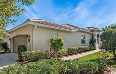 View of property exterior with a garage
