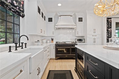 GORGEOUS CHEFS KITCHEN WITH BEAUTIFUL DECORATIVE C