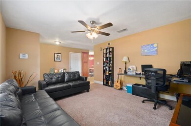 Living room facing foyer area