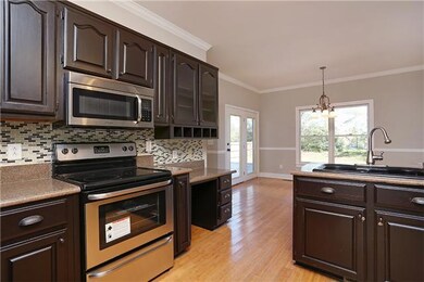 The kitchen area features ample counter top space and cabinets offering the cook of the family a great place to work and make those home made meals.