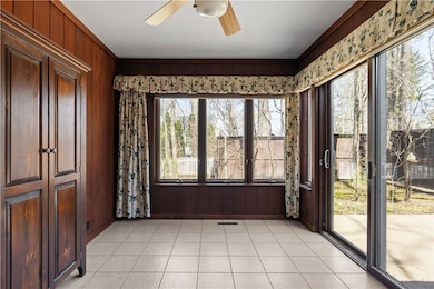 Sun room looking out to patio and backyard