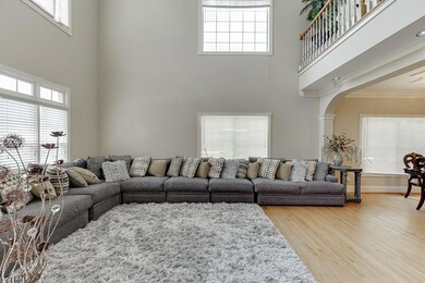 Living area with plenty of natural light, a high c