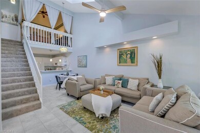 Looking towards the kitchen, loft and stairway to 