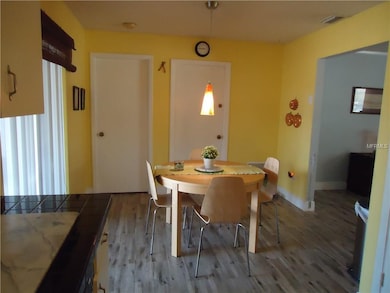 Spacious dining room off kitchen.