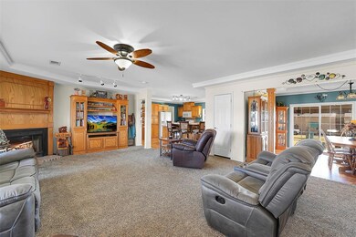 Living area with visible vents, track lighting, or