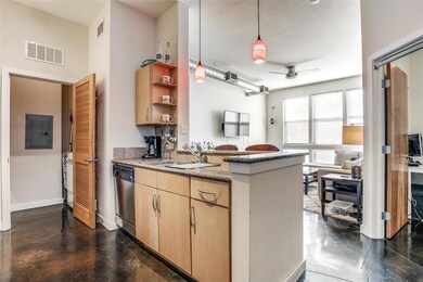 View from kitchen of the living room and second be