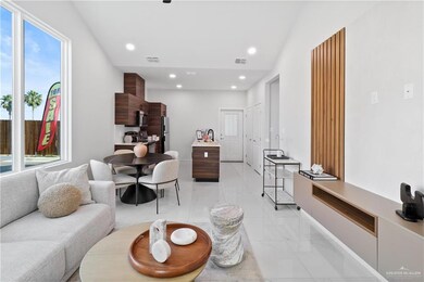 Living area with recessed lighting, visible vents, and marble finish floor