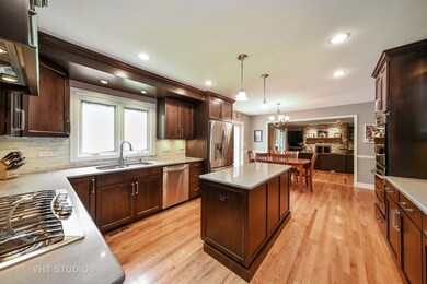 Spectacular Updated Gourmet Kitchen with Center Is
