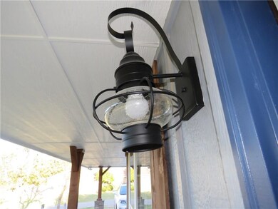 Craftsman light fixture on front porch.