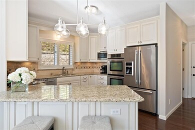 Updated kitchen with breakfast bar.