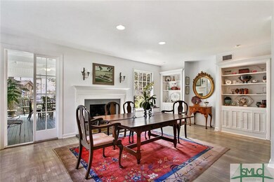 DINING/LIVING ROOM AREA WITH BUILTINS,FIREPLACE AN