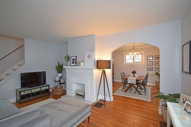 The bright and inviting living room boasts an abun