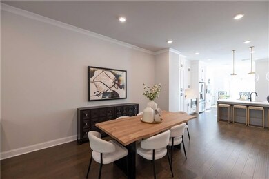 So much space for a large dining table. **Please note the photos shown are of the Jacobsen II floorplan but are not of the actual home.
