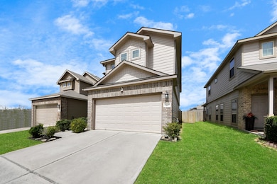 Well-maintained front landscaping. It offers a spa
