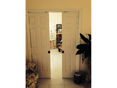 Interior Space/Layout. Double doors lead to bedroo