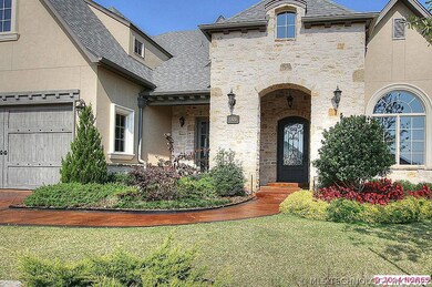 A beautifully stained concrete pathway leads to th