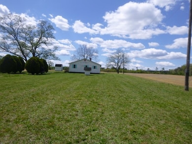 View of grassy yard featuring a view of rural / pastoral area