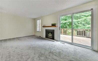 Spacious great room with fresh paint and new carpe