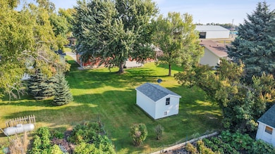 Great back yard! With storage shed, deck and mature trees.