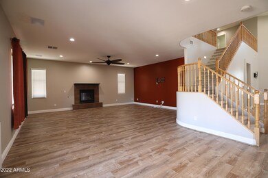 Eating area & family room w/fireplace