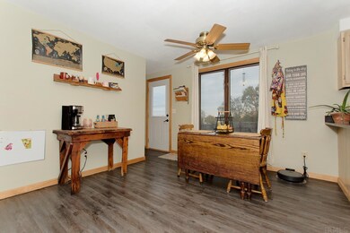 Dining area located in the eat in Kitchen.