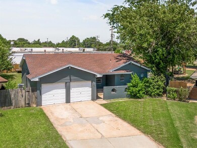 Single story home with a front lawn
