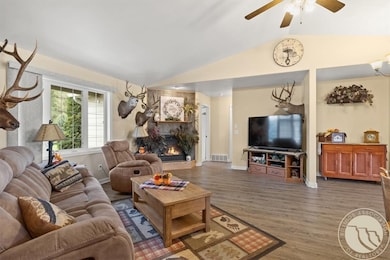 Open living room with cozy gas fireplace