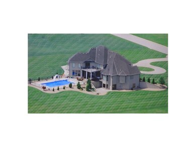 Aerial view of the back of the house with the larg