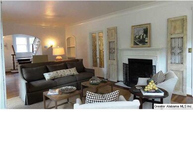Another view of Living Room showing the fireplace,