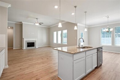 Kitchen is open to the Greatroom and Dining