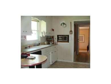 ONE VIEW OF KITCHEN, WITH HALLWAY TO OFFICE, BACK 