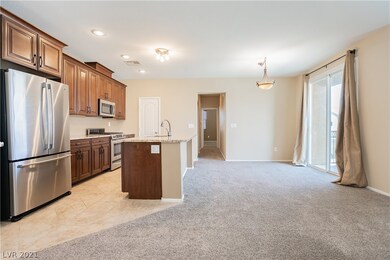 Island kitchen with granite counters, stainless st