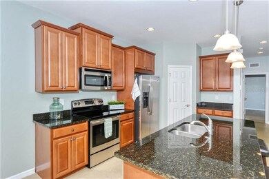 Kitchen with granite counters and stainless applia