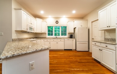 Spacious kitchen with granite counter tops