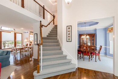 Gleaming hardwood floors in this light and bright 