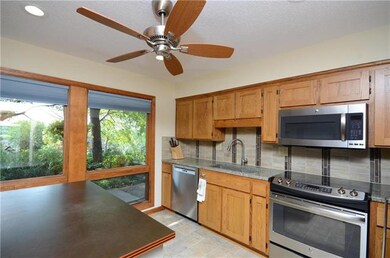 Updated kitchen with custom cabinets and stainless
