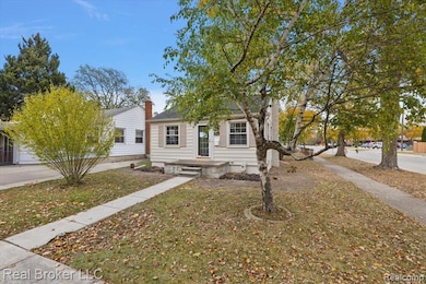 View of front of house with a front yard