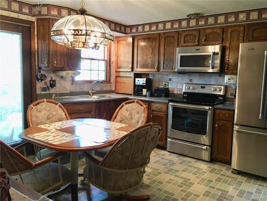 Beautiful Kitchen with Corian counter tops and SS 