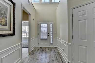 Foyer entrance featuring light wood finished floor