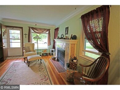 Gleaming woods and graceful coved ceilings complim
