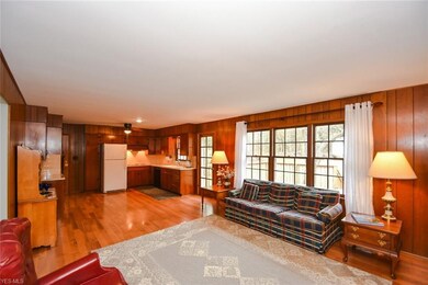 Family Room with three large windows to enjoy the 