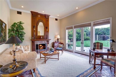 An inviting Living Room crackling fireplace. The l