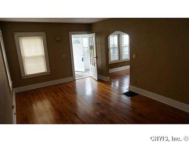 Living Room. Gleaming refinished hardwoods through