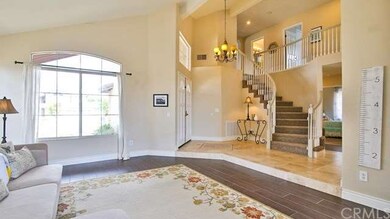 High vaulted ceilings and beautiful stairway