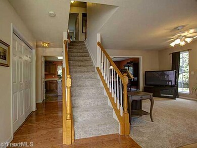 Entry. Front entryway has hardwoods with a 1/2 bath just off to your left and leads to the kitchen on the back side.