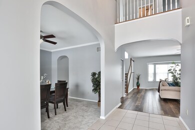 Welcoming 2 story, 12x6 Foyer guides you to the Gr